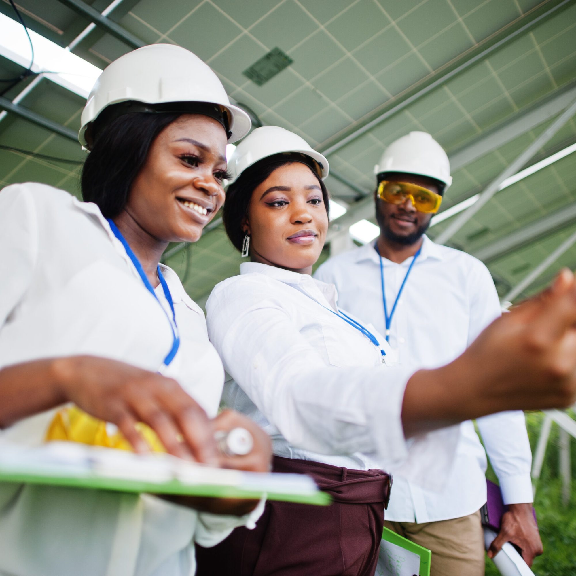 african american technician checks the maintenance of the solar